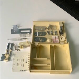 Vintage Singer sewing accessories in original box